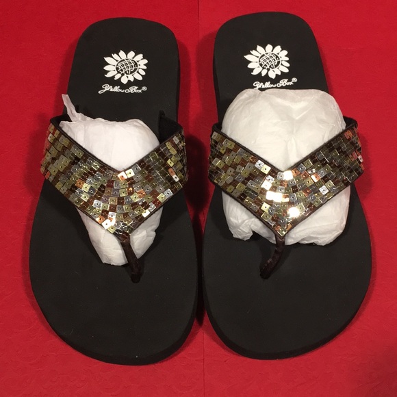yellow box sandy flip flops